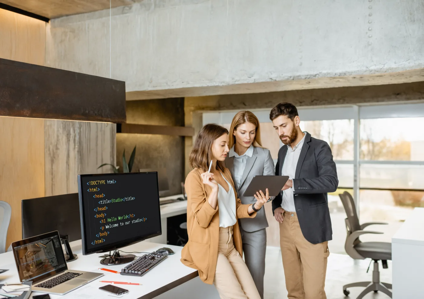 Digital team reviewing a web strategy in an office